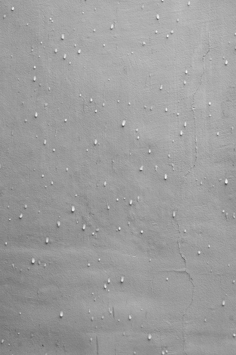 Rain Drops on a White Wall
